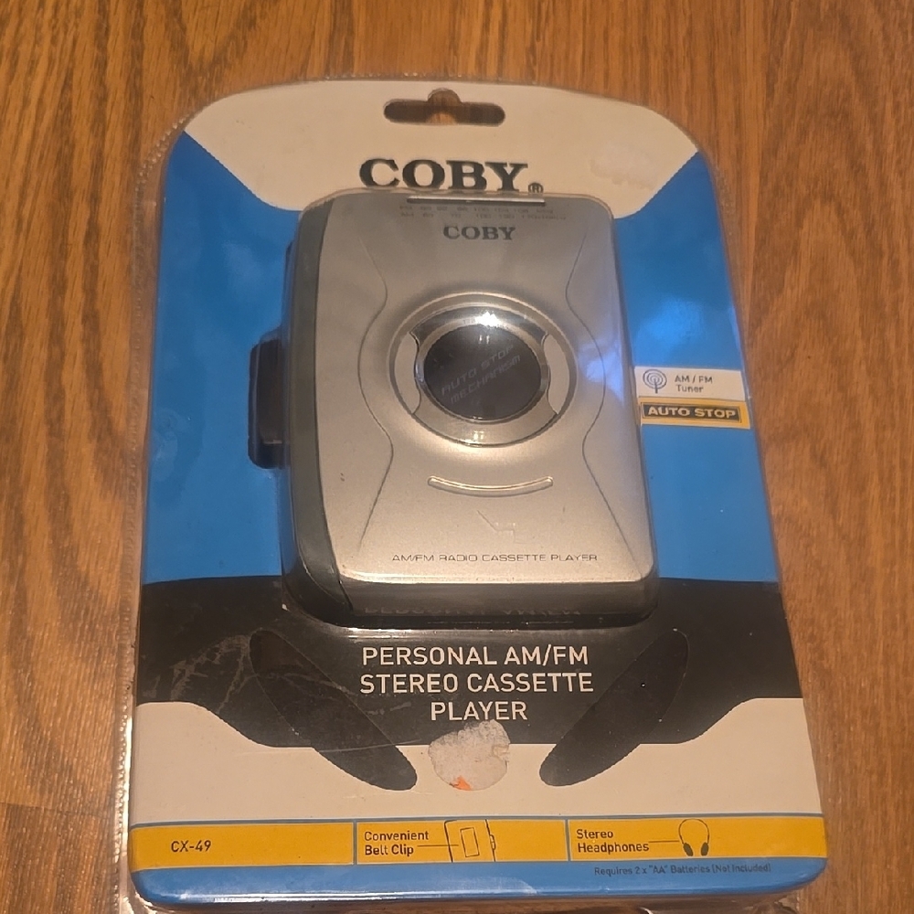 Silver and Black Digital Camera with Circular Lens